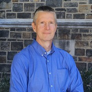 Doug Bruce image outside Alumni Memorial
